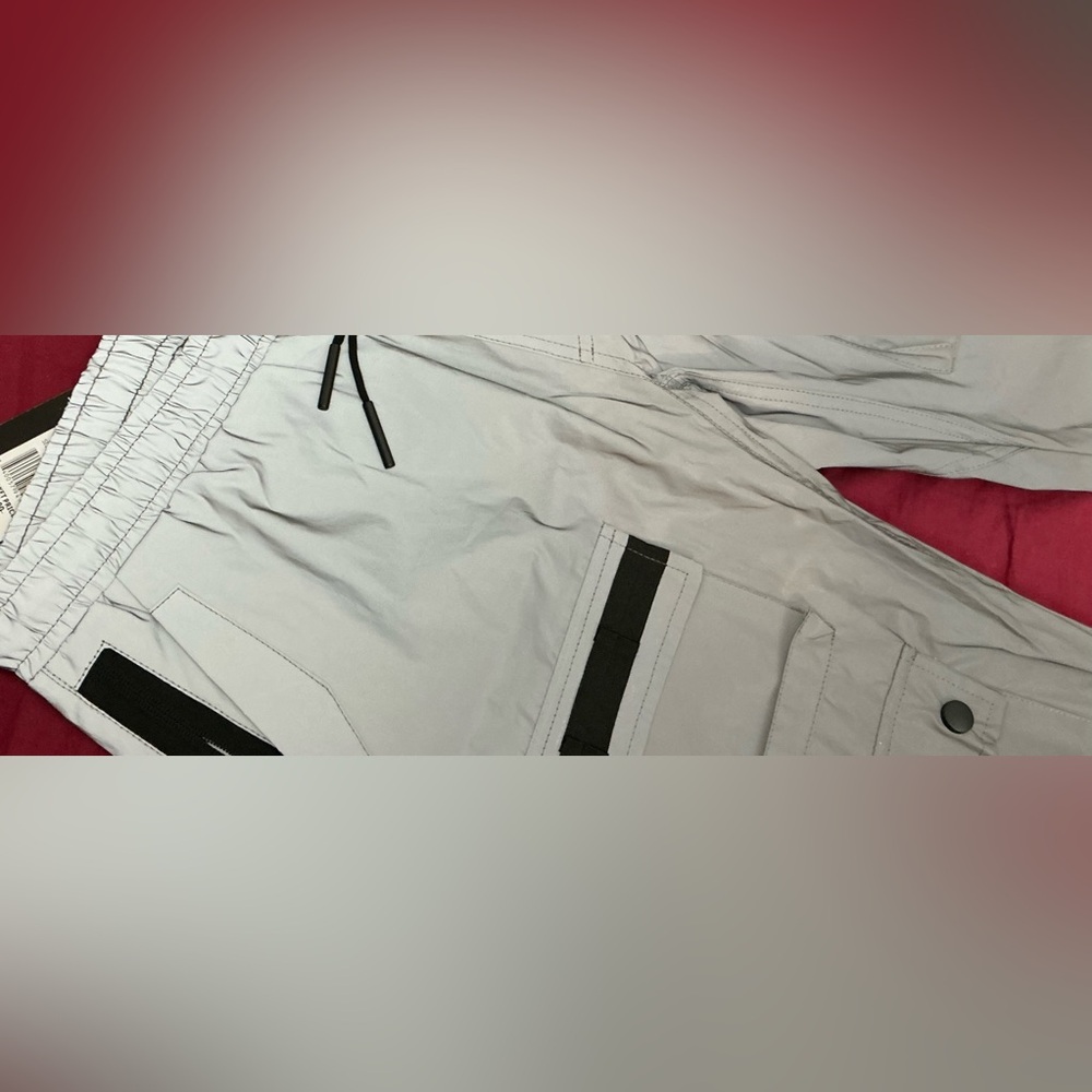 American Stich silver waterproof pants.
Size large.